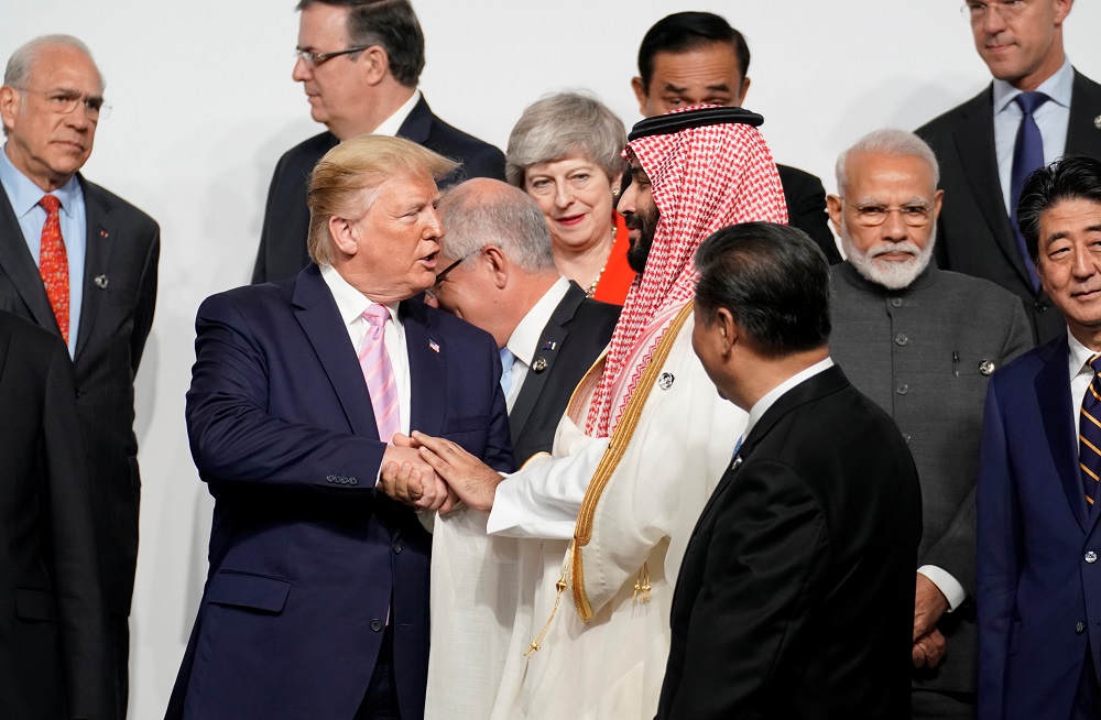 7347898486447377 U.S. President Donald Trump, left, speaks with Saudi Arabia's Crown Prince Mohammed bin Salman during family photo session at G-20 leaders summit in Osaka, Japan, Friday, June 28, 2019.JPG