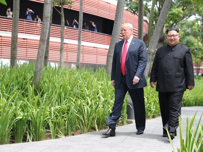 مع رئيس كوريا الشمالية (رويترز).jpg