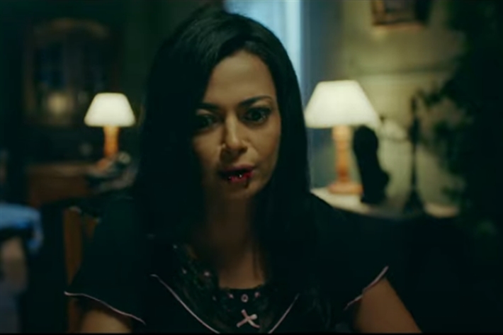 داليا مصطفى في مشهد من الفيلم.png