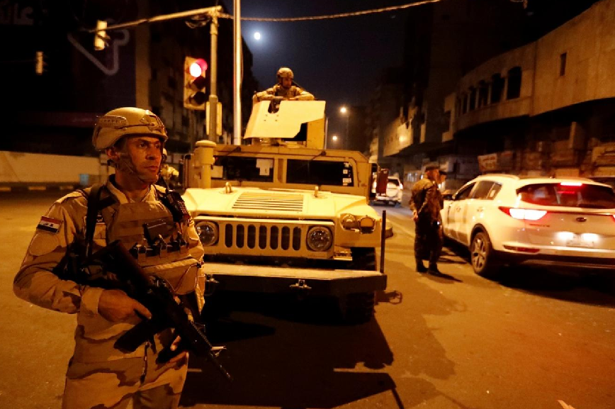 عسكريون اميركيون-مطار بغداد.png