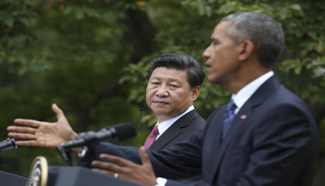 أوباما وشي جينبينغ لدى إعلان الانفراج السيبراني في البيت الأبيض سبتمبر 2015