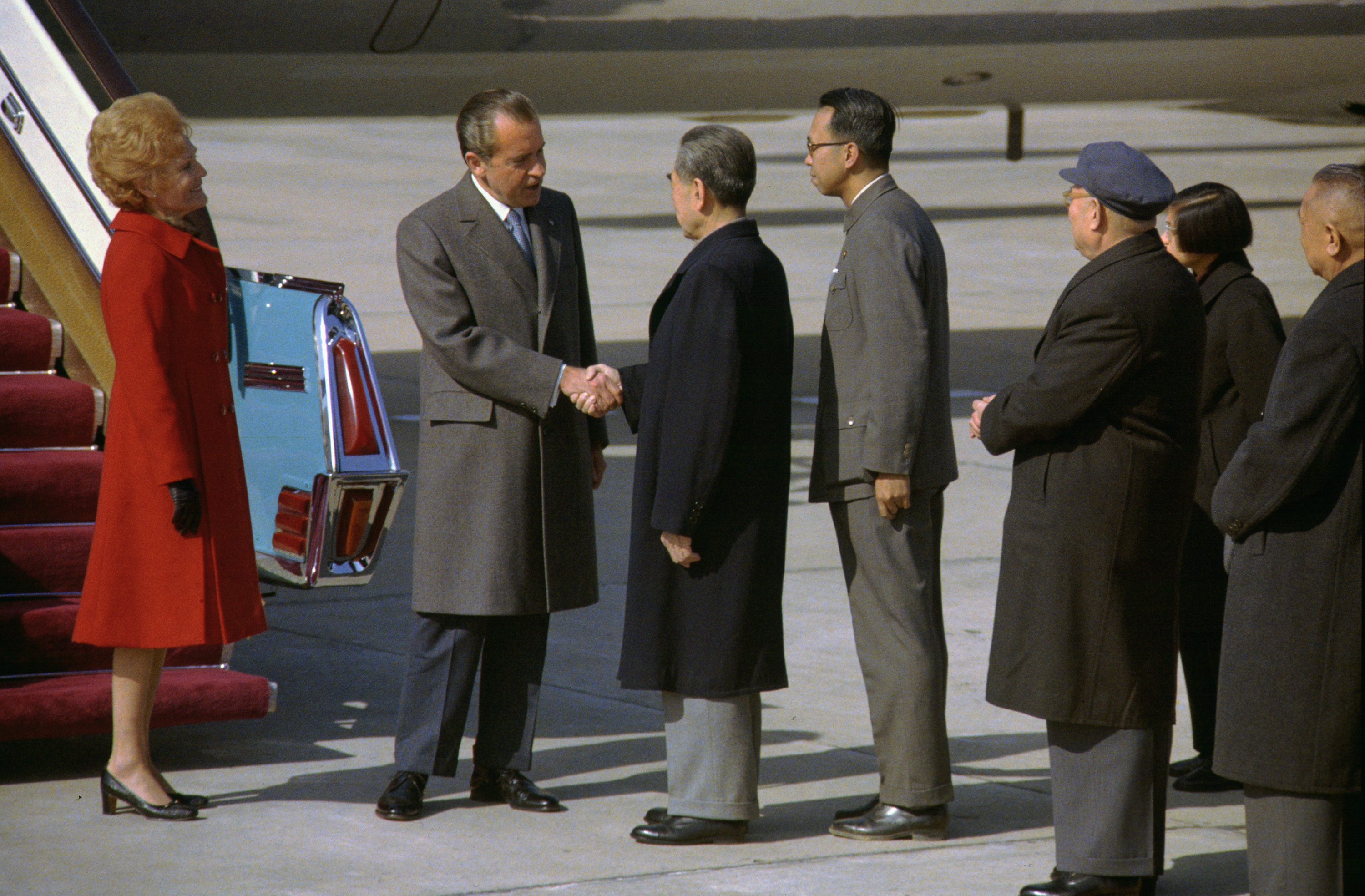 President_Richard_Nixon_and_Premier_Chou_En-Lai_Shake_Hands_at_the_Nixons'_Arrival_in_Peking,_China.jpg