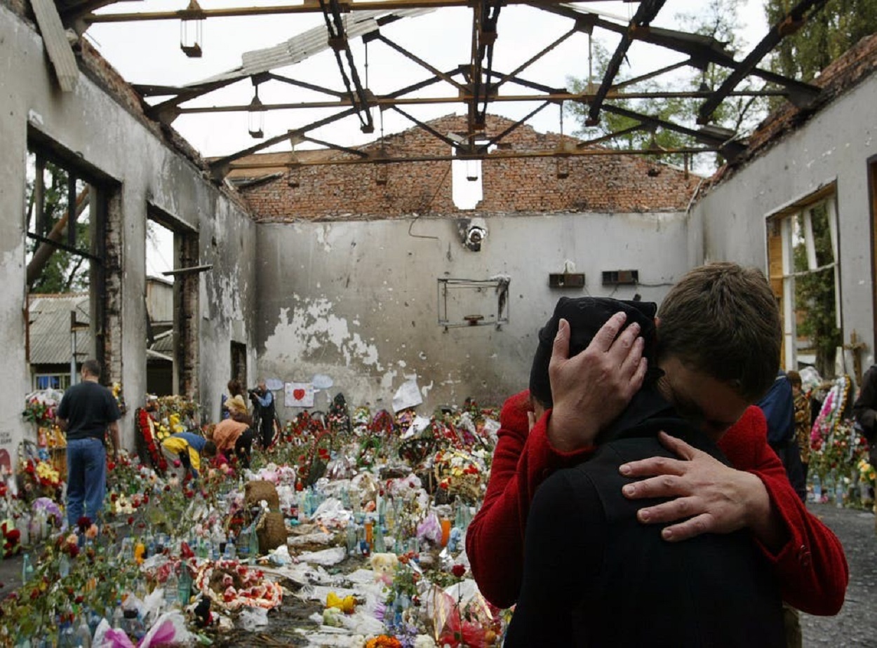 Ossetian women mourn at the destroyed school’s gymnasium in Beslan_getty.jpg