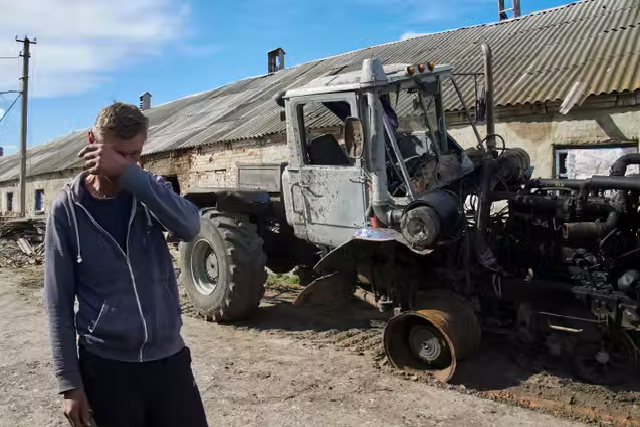 A local man saw his tractor destroyed on a farm in the village of Mala Rohan.png