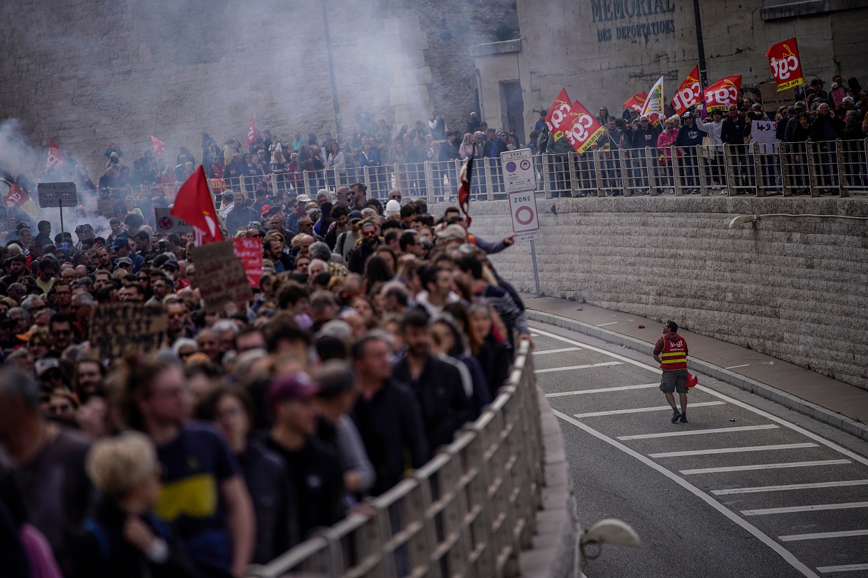 Protesters march during a rally in Marseille on Thursday_AP.jpg