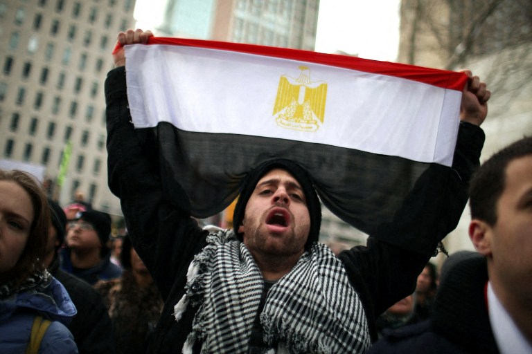 AFP__20110129__GYI0063247273__v1__Preview__ProtestorsRallyAtUNOnTurmoilInEgypt.jpg