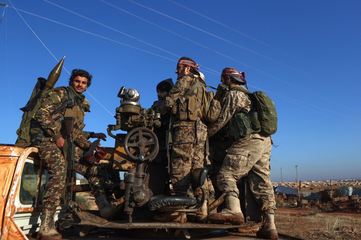 AFP__20241128__36NF2PL__v2__Preview__SyriaConflictJihadist.jpg