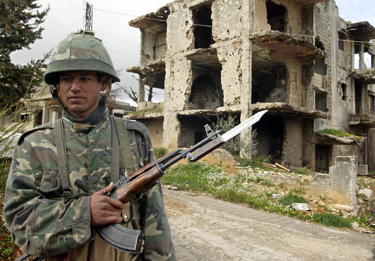 AFP__20050311__NIC2005030997754__v2__Preview__LebanonSyriaTroopsWithdrawal.jpg