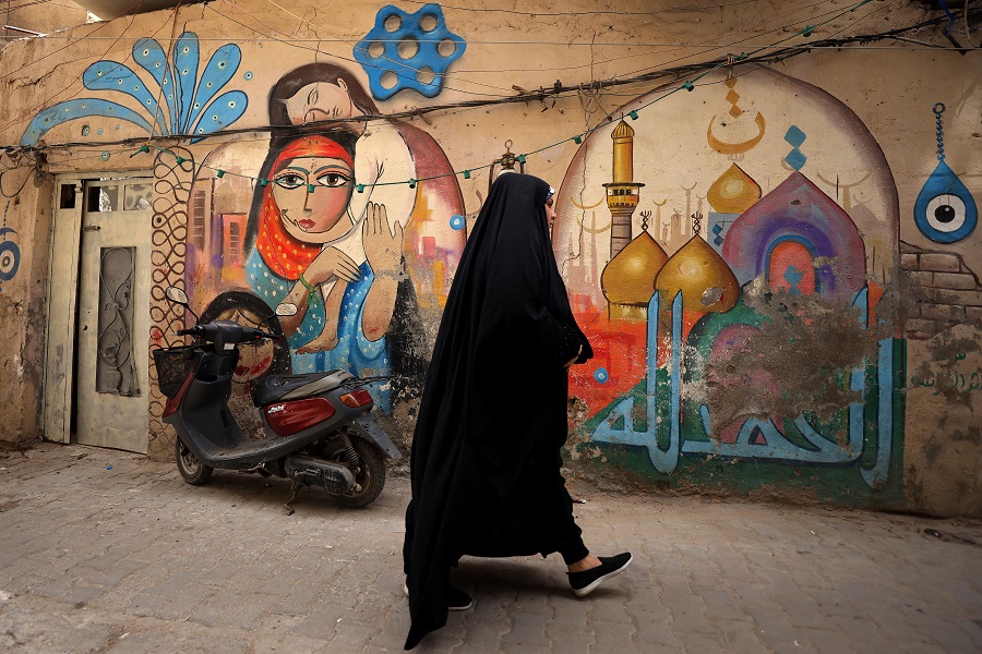 AFP__20230410__33CY2RP__v1__HighRes__IraqCultureStreetArt.jpg