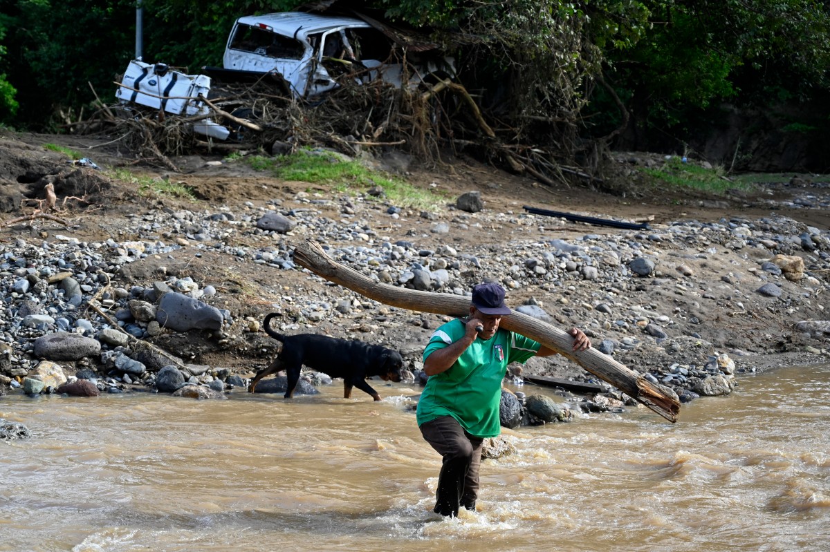 AFP__20251018__799P9W4__v1__MidRes__HondurasClimateRains.jpg