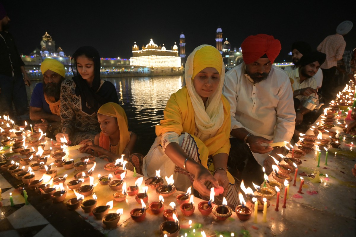 AFP__20251021__79JK6NQ__v1__MidRes__IndiaReligionSikhismFestival.jpg