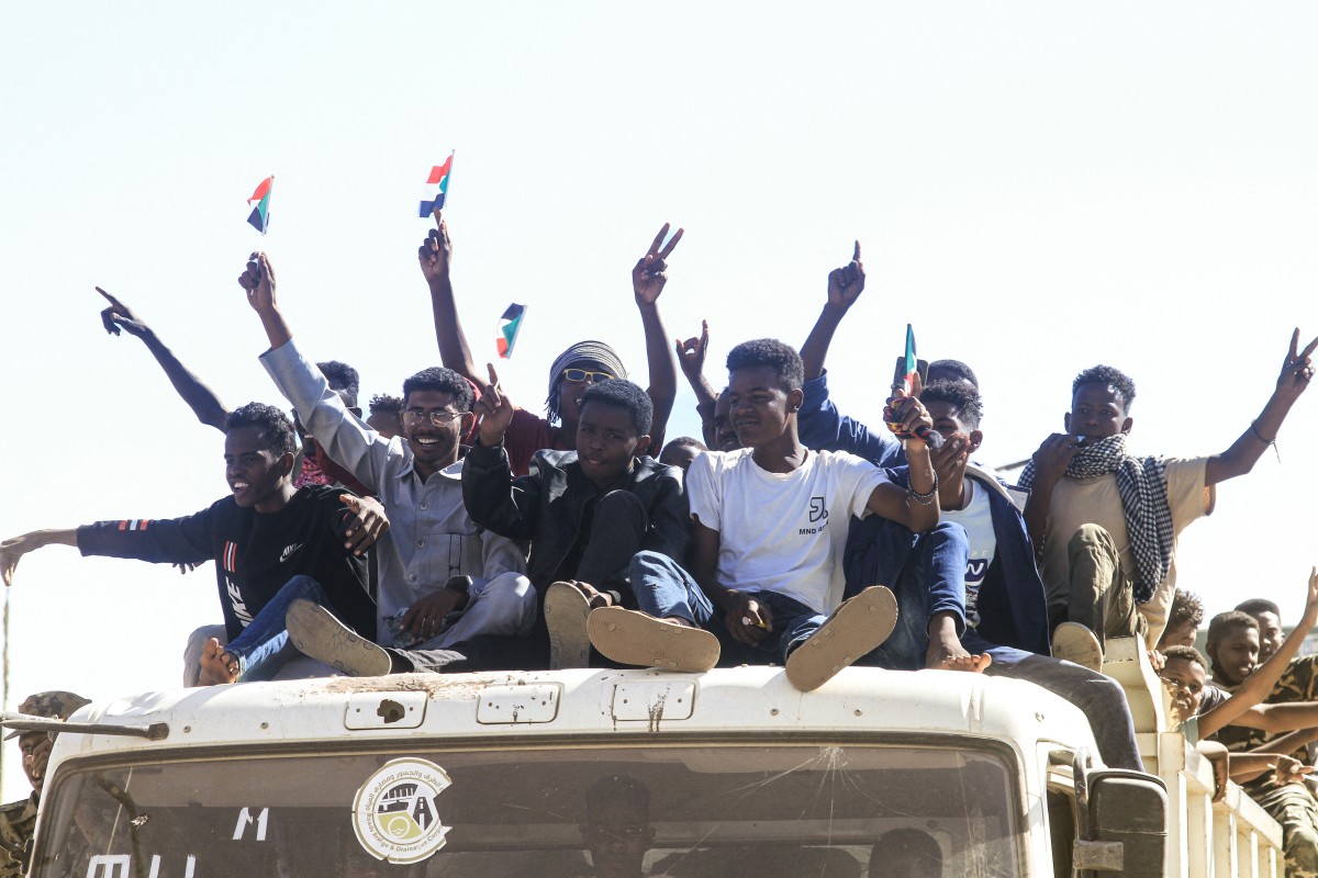 AFP__20251213__88266CV__v3__MidRes__SudanConflictProtest.jpg
