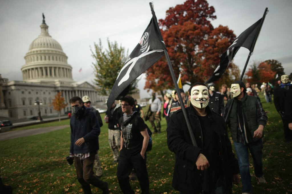 AFP__20131105__187005641__v7__MidRes__AntiGovernmentMillionMaskMarchHeldInDc.jpg