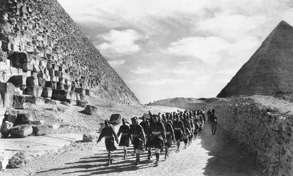 british-troops-marching-through-the-great-pyramids-of-egypt.jpg