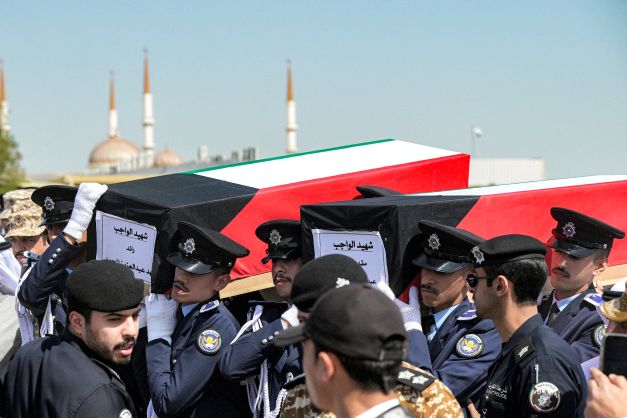 AFP__20260309__A2H2979__v1__HighRes__KuwaitIranUsIsraelWarFuneral.jpg