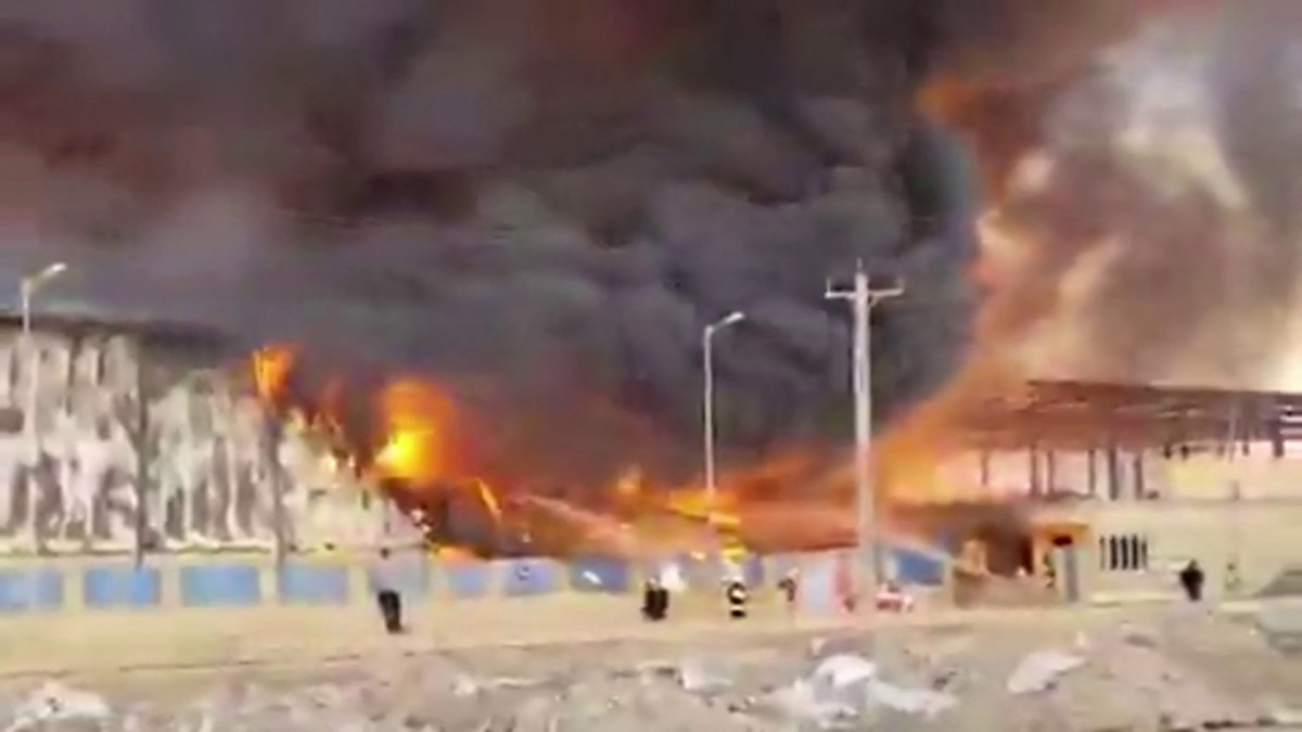AFP__20260226__994D7KF__v1__MidRes__IranFire.jpg