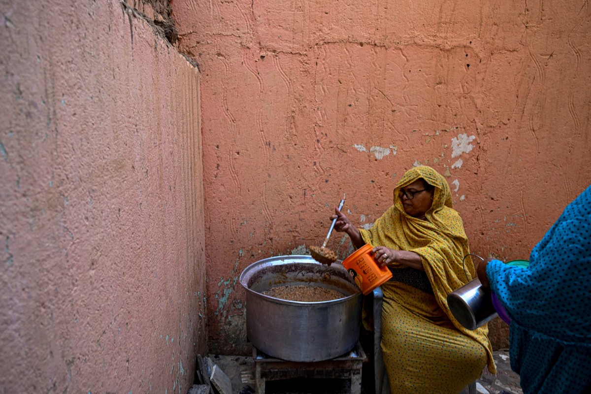 AFP__20260421__A8GM8NQ__v3__MidRes__TopshotSudanConflictFood.jpg
