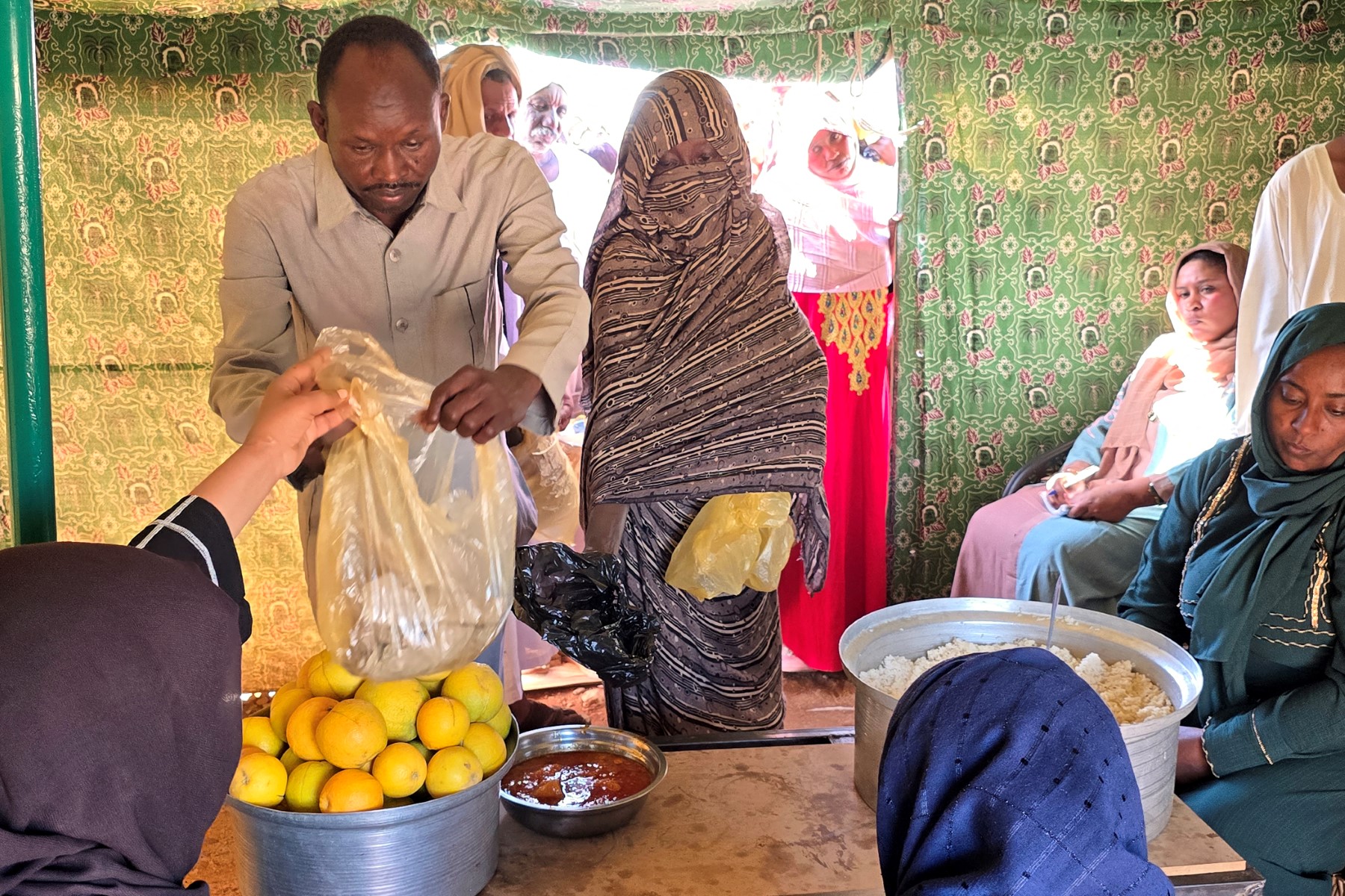 AFP__20250110__36TG3U9__v1__MidRes__SudanConflictDisplacedAid.jpg