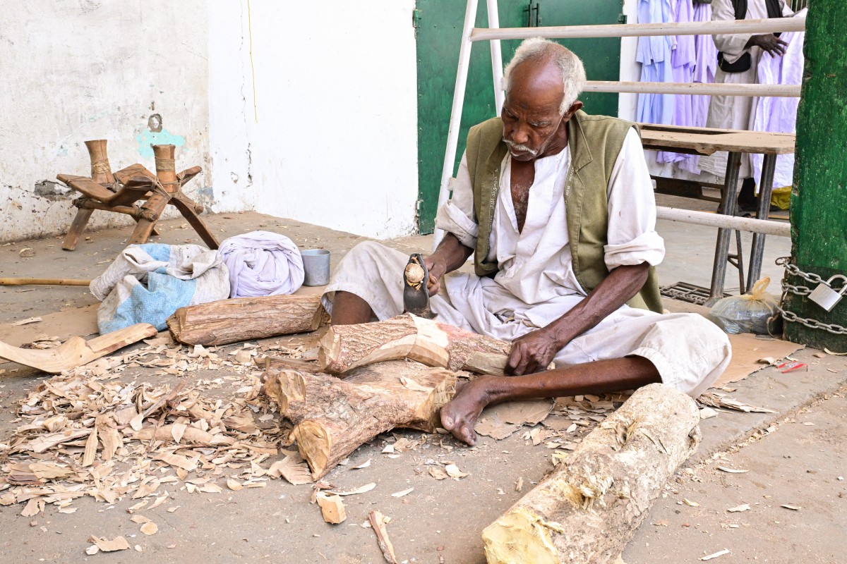AFP__20260428__A98K763__v1__MidRes__SudanBejaSwordMaking.jpg