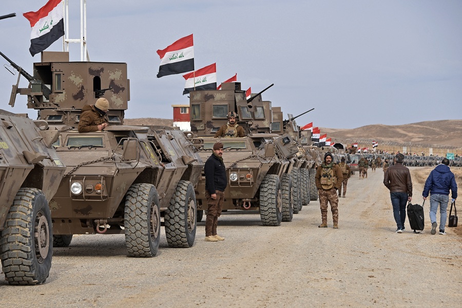 AFP__20260122__93MD2T6__v1__HighRes__IraqSyriaConflictKurdsIs.jpg