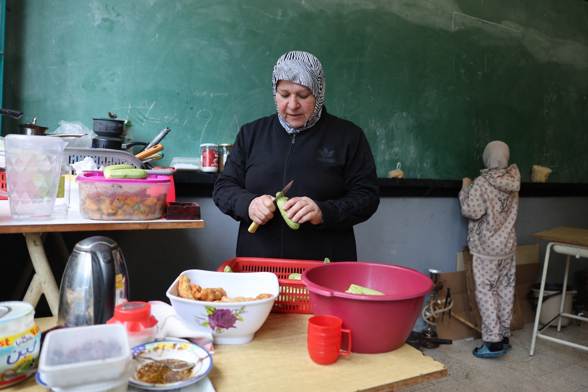 AFP__20260324__A4JB8WE__v1__MidRes__LebanonIsraelIranUsWarDisplaced.jpg
