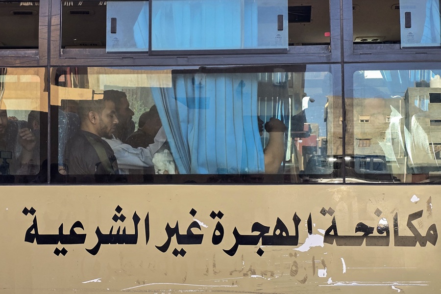 AFP__20250726__67WF9EG__v1__HighRes__LibyaEconomyMigration.jpg
