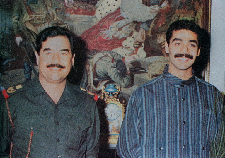 AFP__20021222__APP2002122207495__v1__MidRes__IraqHussein (1).jpg