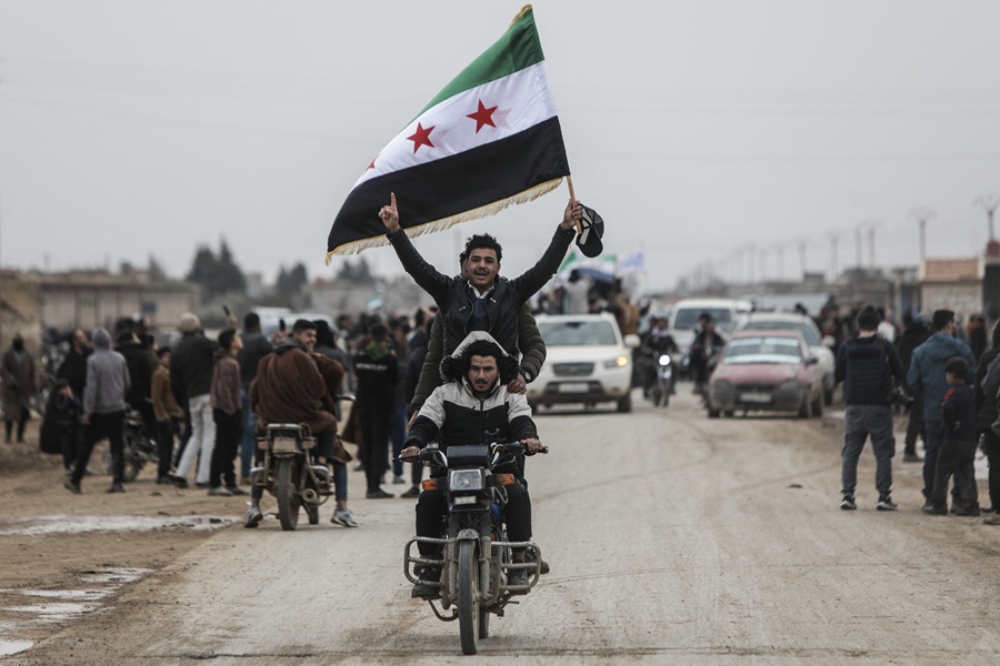 AFP__20260203__94YF2CQ__v4__HighRes__TopshotSyriaKurdsConflictDeal.jpg