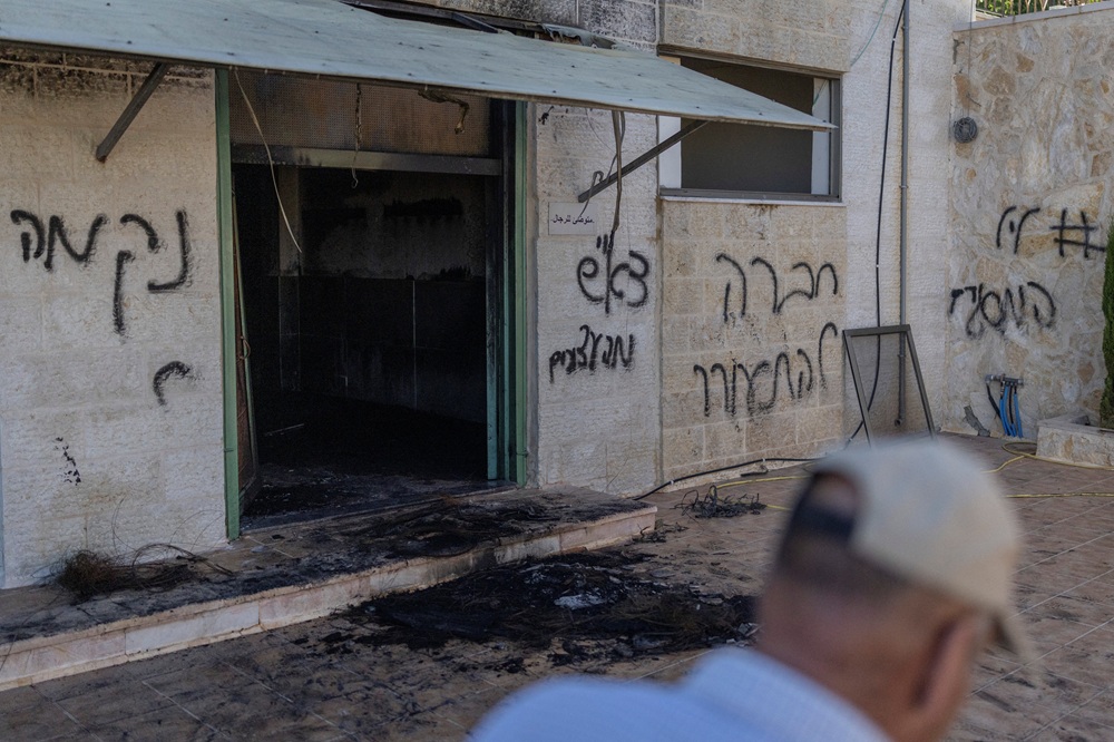 AFP__20260617__B7CT8EF__v1__HighRes__PalestinianIsraelConflictWestbankSettlers.jpg