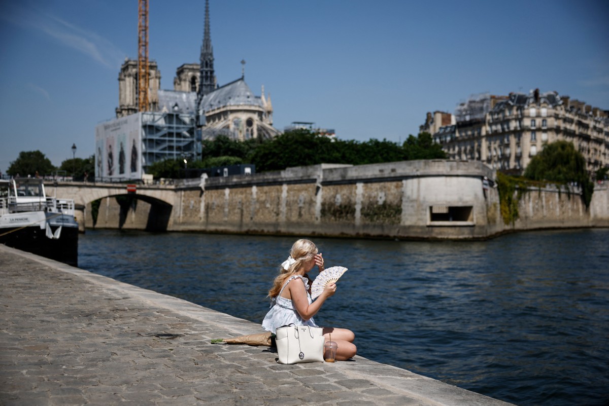 AFP__20260528__B4BB3NQ__v3__MidRes__FilesFranceParisHeatCentury.jpg