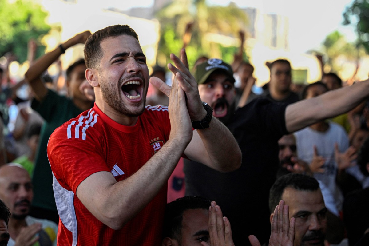 AFP__20260627__B8HC8T3__v1__MidRes__EgyptFblWc2026Fans.jpg