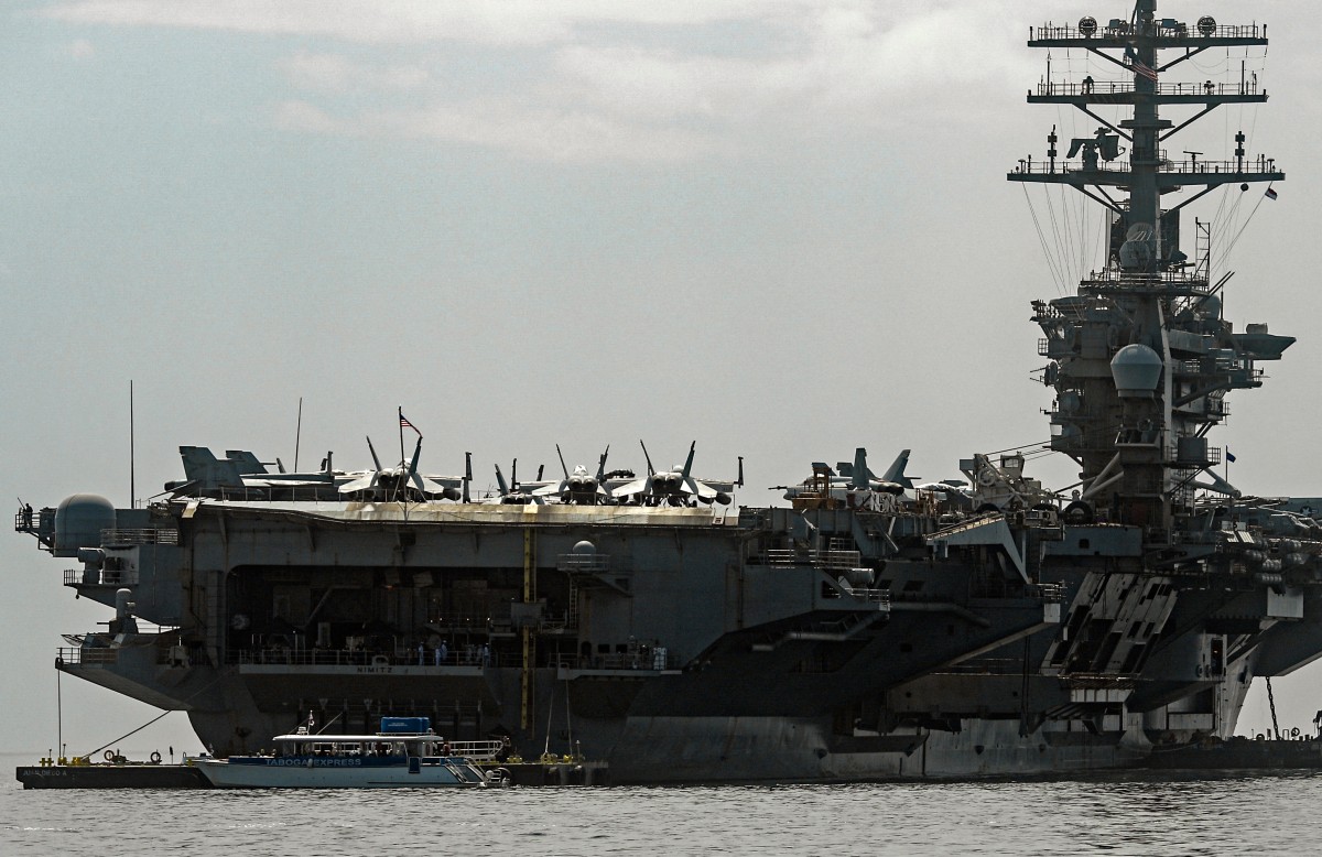AFP__20260330__A68R6NQ__v1__MidRes__PanamaUsNavyAircraftCarrier.jpg