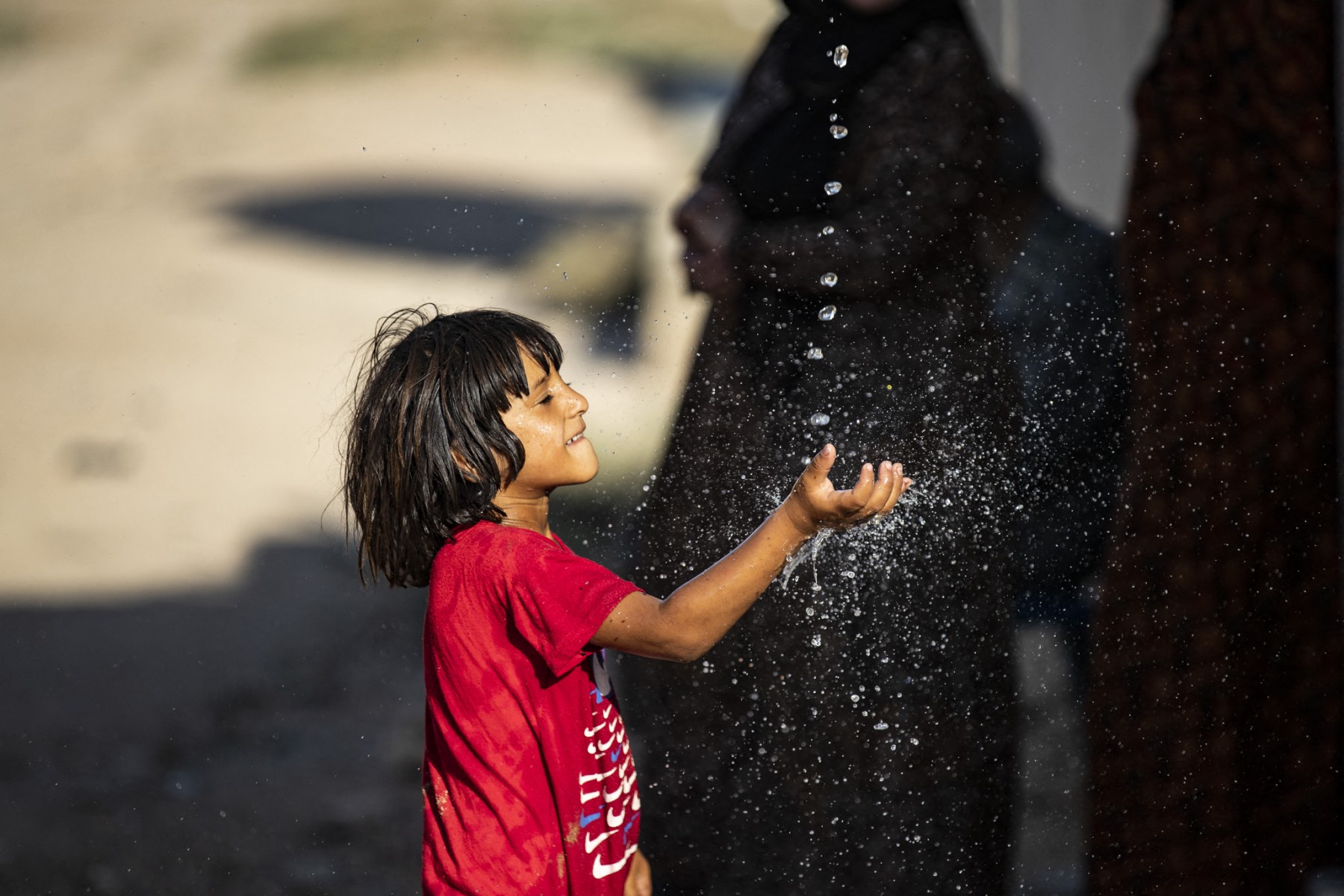 AFP__20200825__1WO6HL__v11__MidRes__TopshotSyriaKurdsWater.jpg