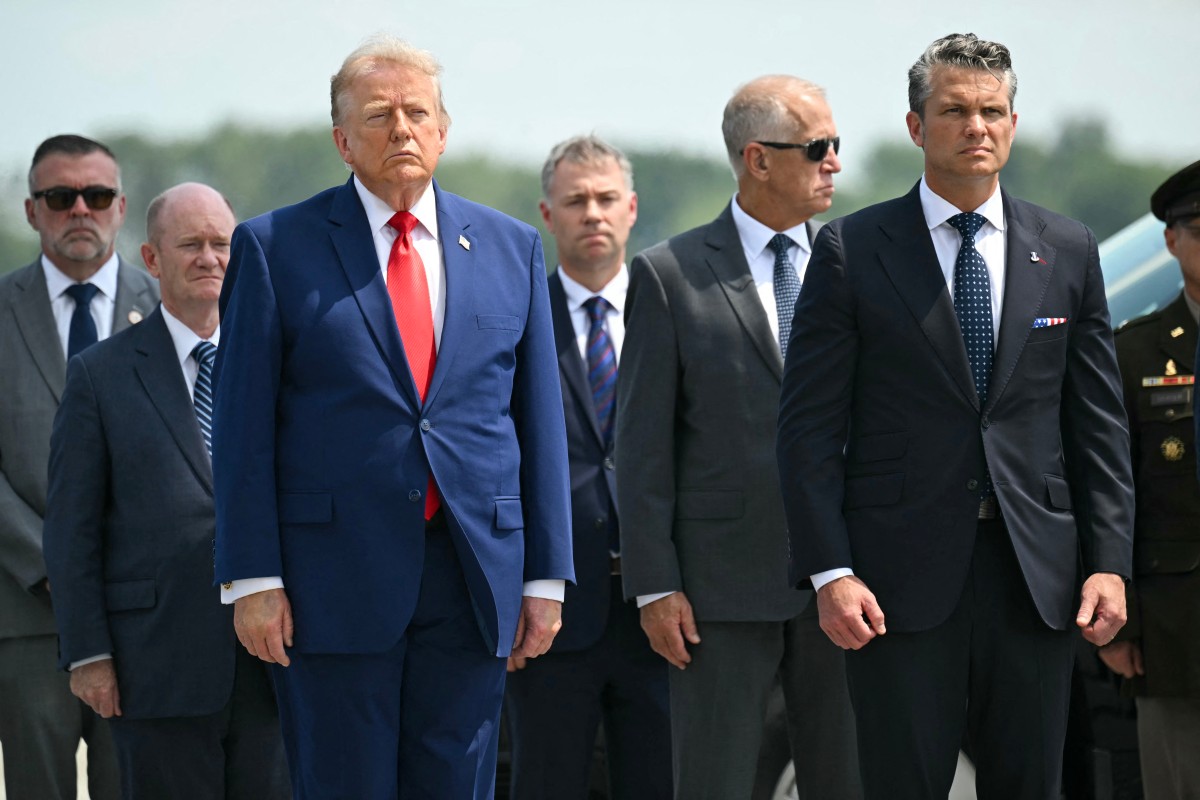 AFP__20260722__C2VY9VK__v1__MidRes__UsPresidentDonaldTrumpAttendsADignifiedTransferS.jpg