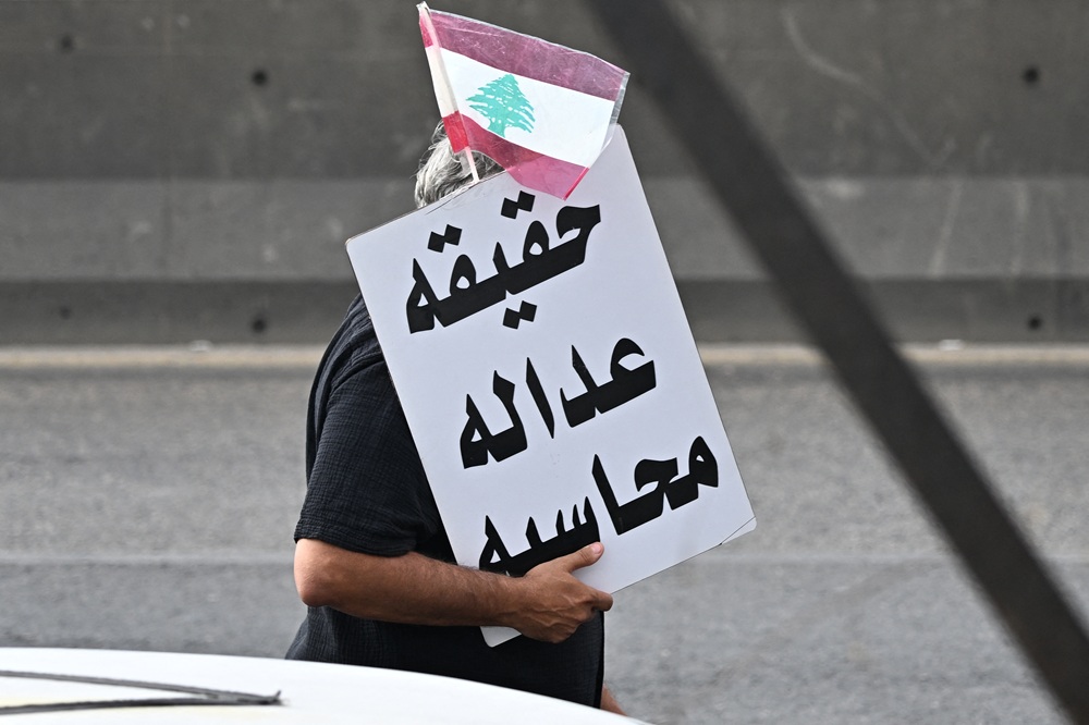 AFP__20250804__68PT92D__v2__HighRes__LebanonBlastAnniversary.jpg