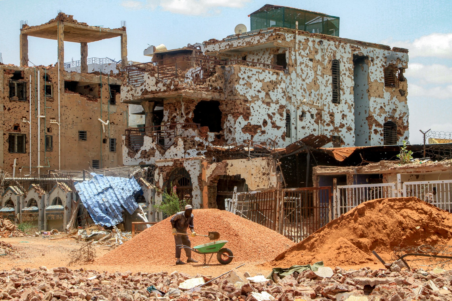 AFP__20250730__68BT49E__v2__MidRes__TopshotSudanConflictReconstruction.jpg