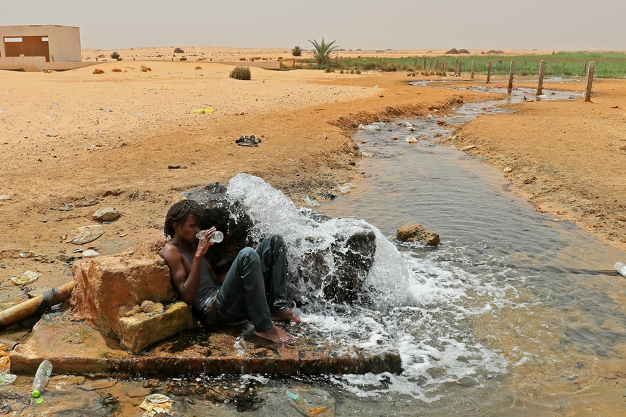 AFP__20230730__33QD4CG__v4__HighRes__TopshotLibyaTunisiaMigrants.jpg