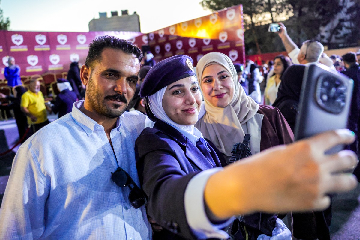 AFP__20260922__C92R2W8__v2__MidRes__SyriaConflictPoliceWomen.jpg